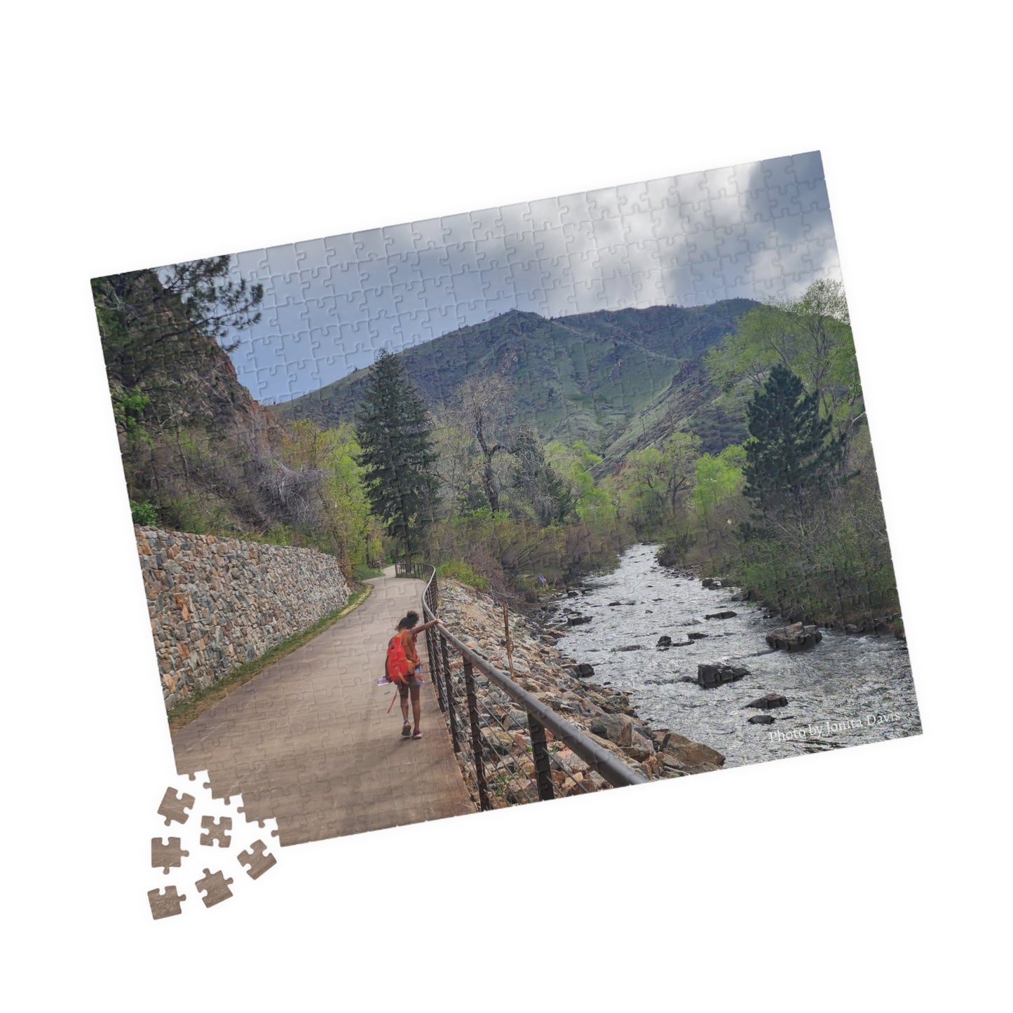 Puzzle - Girl Walking Along Clear Creek in Golden CO in Spring